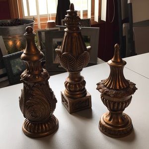 Gold molded resin finials.